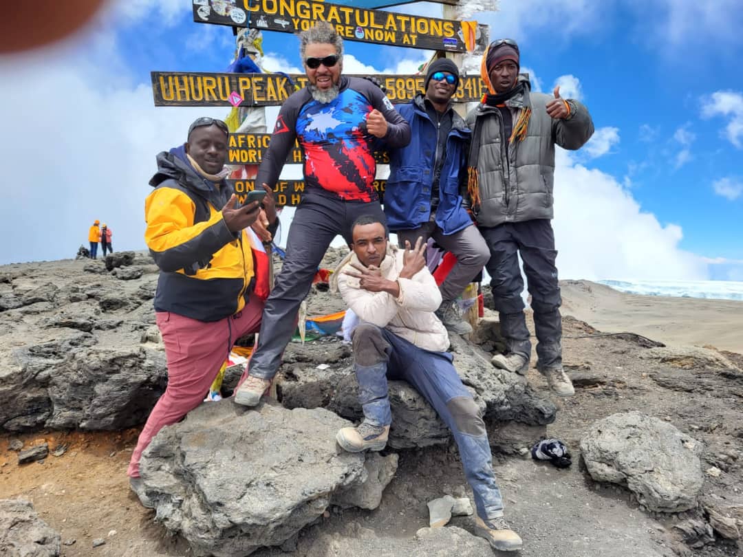 Summit celebration at Kilimanjaro