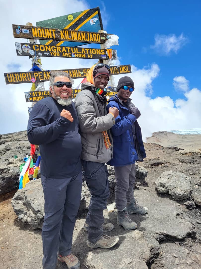 Ravison Amani Kiwia at Uhuru Peak, Kilimanjaro